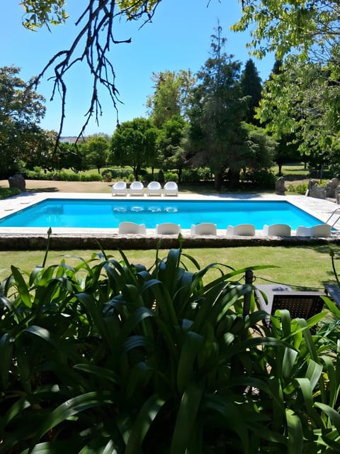 Property building, Living room, Swimming pool