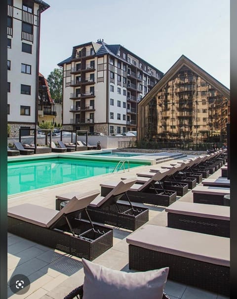 Property building, Pool view, Swimming pool, sunbed