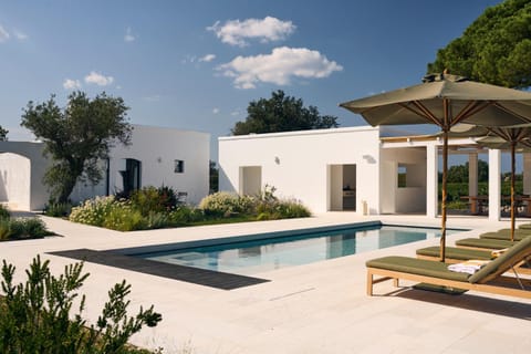 Property building, Solarium, Swimming pool, sunbed