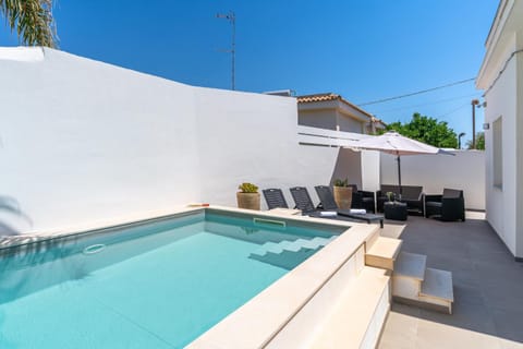 Property building, Living room, Swimming pool
