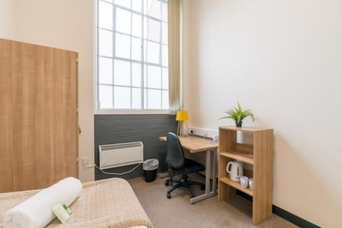 Bed, Seating area, wardrobe