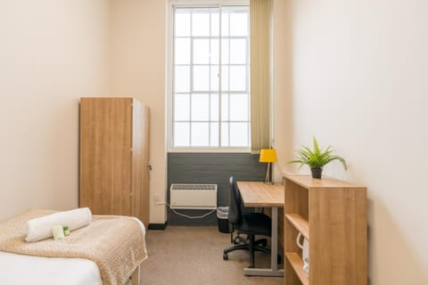 Bed, Seating area, wardrobe