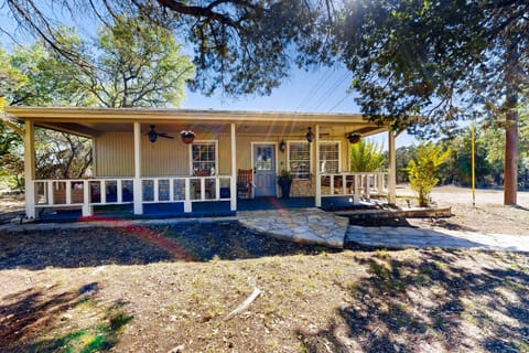 Dog-friendly country cottage with scenic hill views, wrap-around porch, and W/D House in Wimberley
