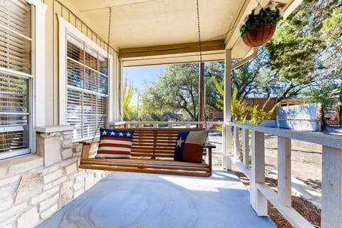 Dog-friendly country cottage with scenic hill views, wrap-around porch, and W/D House in Wimberley