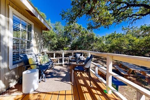 Dog-friendly country cottage with scenic hill views, wrap-around porch, and W/D House in Wimberley