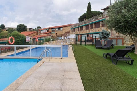 Property building, Living room, Swimming pool