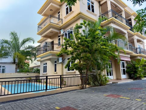 Property building, Patio, Day, View (from property/room), Balcony/Terrace, Balcony/Terrace, Pool view, Swimming pool, sunbed