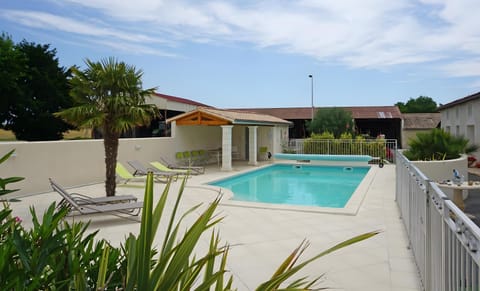 Property building, Living room, Swimming pool