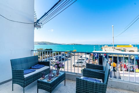 View (from property/room), Balcony/Terrace, Seating area, Sea view, Sunset