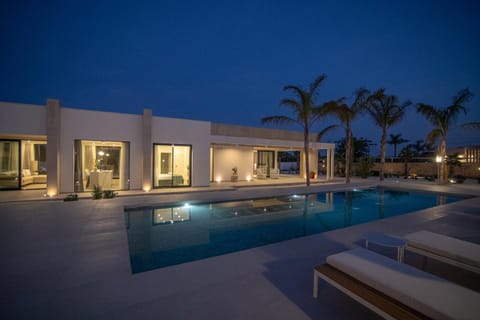 Property building, Night, Pool view, Swimming pool, sunbed