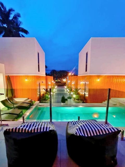 Patio, Night, Natural landscape, Living room, Seating area, Pool view, Swimming pool, sunbed
