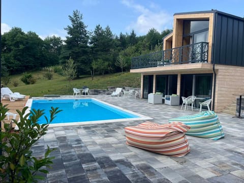 Property building, Natural landscape, Garden view, Pool view, Swimming pool