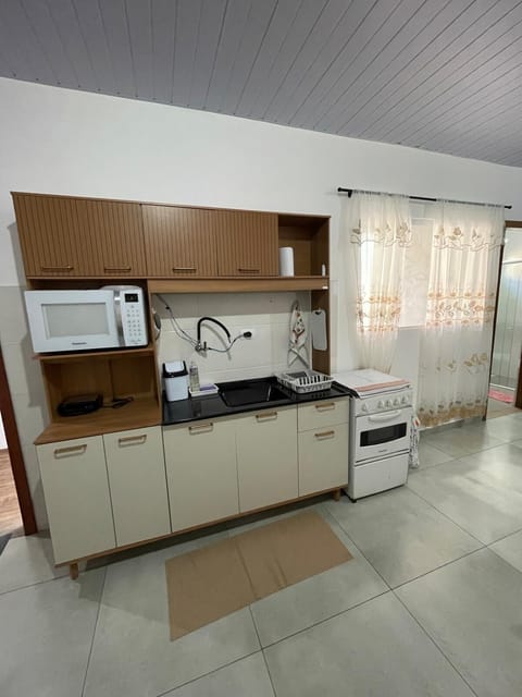 Kitchen or kitchenette, oven, stove, toaster