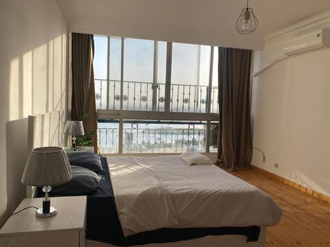 Bed, Natural landscape, View (from property/room), Photo of the whole room, Bedroom, River view