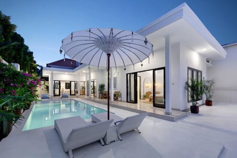 Property building, Patio, Pool view, Swimming pool, sunbed