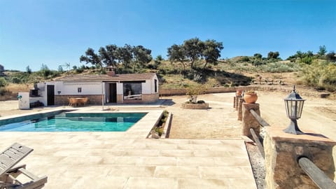 Property building, Day, Natural landscape, Pool view, Swimming pool, sunbed