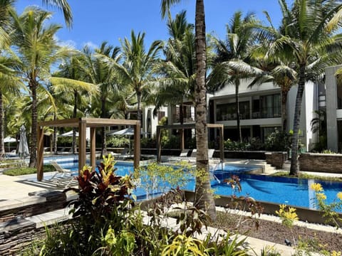 Property building, Garden, Pool view, Swimming pool, sunbed