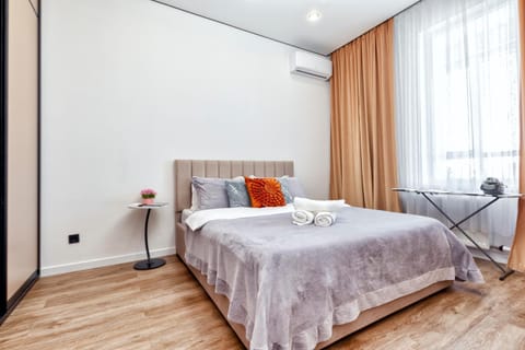 Bed, Photo of the whole room, Bedroom, towels, air conditioner