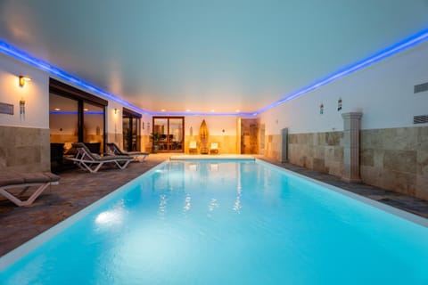 Property building, Living room, Swimming pool