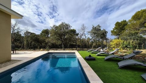 Natural landscape, Garden, Garden view, Swimming pool, sunbed