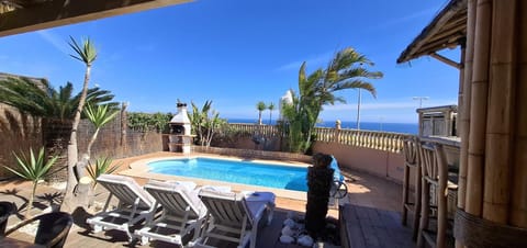 Swimming pool, sunbed