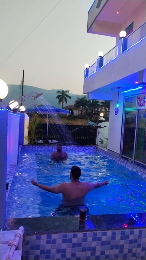 People, Natural landscape, Pool view, Swimming pool, group of guests