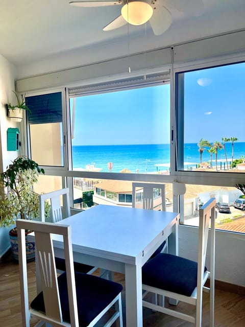 Natural landscape, View (from property/room), Living room, Seating area, Dining area, Beach, Sea view