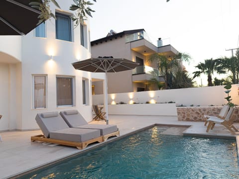 Property building, Pool view, Swimming pool, sunbed