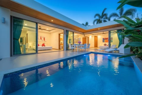 Property building, Patio, Pool view, Swimming pool, sunbed