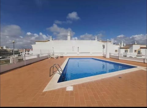 Property building, Pool view, Swimming pool, sunbed