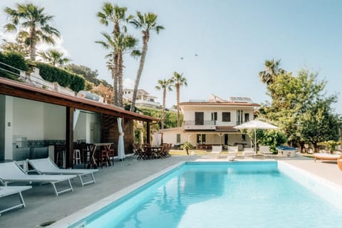 Property building, Patio, Swimming pool