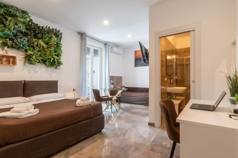 Bed, Bathroom, Living room, Seating area, Bedroom