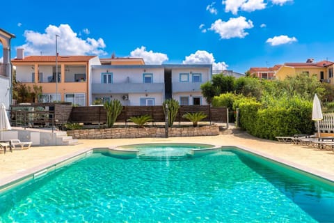 Property building, Living room, Swimming pool