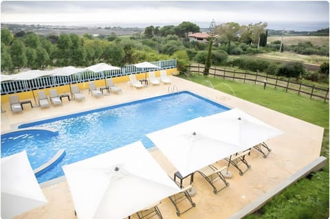 Property building, Living room, Swimming pool