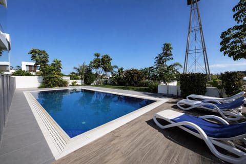 Swimming pool, sunbed