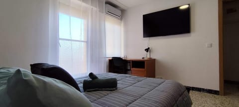 TV and multimedia, Seating area, furniture, towels, air conditioner
