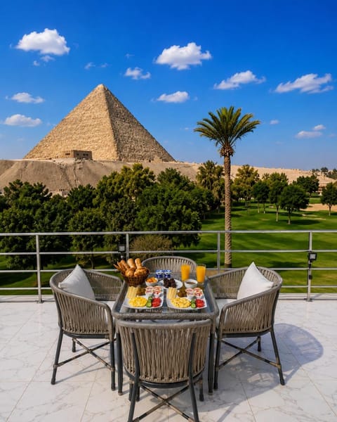 Property building, Patio, Nearby landmark, Day, Natural landscape, Garden, View (from property/room), Balcony/Terrace, Living room, Food and drinks, Seating area, Dining area, Food, Garden view, Drinks