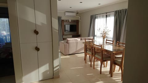 TV and multimedia, Kitchen or kitchenette, Living room, Seating area, Dining area, air conditioner