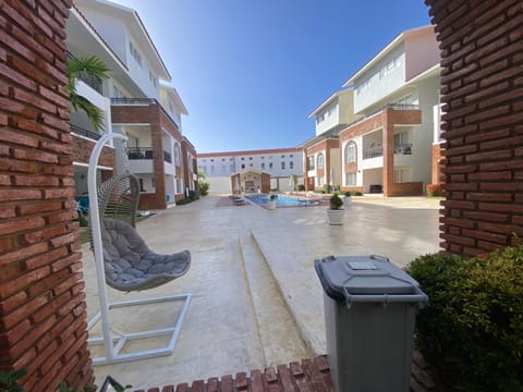 Property building, Patio, Day, Pool view, Swimming pool, sunbed
