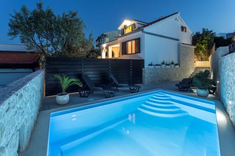 Property building, Night, Pool view, Swimming pool, sunbed