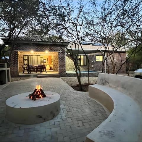 Property building, Patio, BBQ facilities, Swimming pool, fireplace
