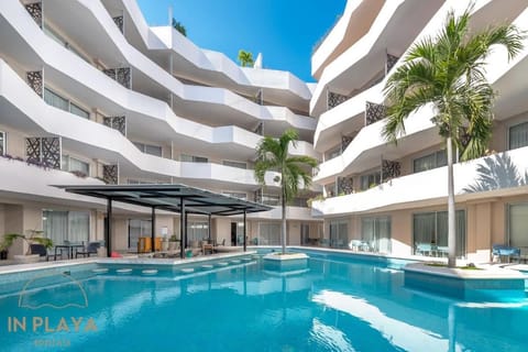 Property building, Day, Pool view, Swimming pool, sunbed
