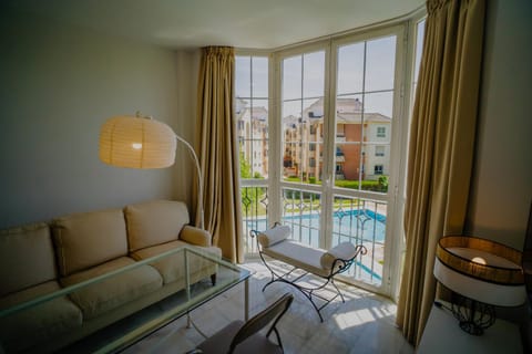 Living room, Seating area, Pool view, Swimming pool