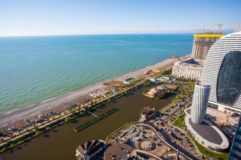 Property building, Nearby landmark, Day, Natural landscape, Bird's eye view, Beach, City view, Sea view