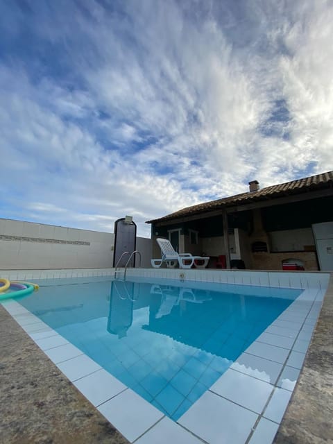 Swimming pool, sunbed