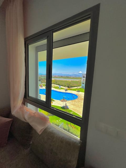 View (from property/room), Balcony/Terrace, Lake view, Pool view
