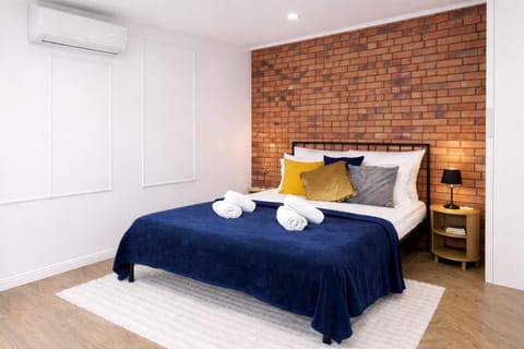 Bed, Photo of the whole room, Bedroom, towels, air conditioner