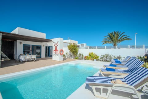 Property building, Living room, Swimming pool