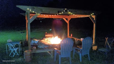 Patio, Night, Seating area, fireplace