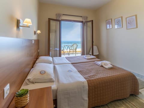 Photo of the whole room, Bedroom, Sea view, towels